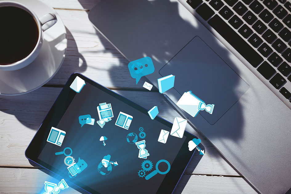 cloud computing icons coming out of tablet screen.