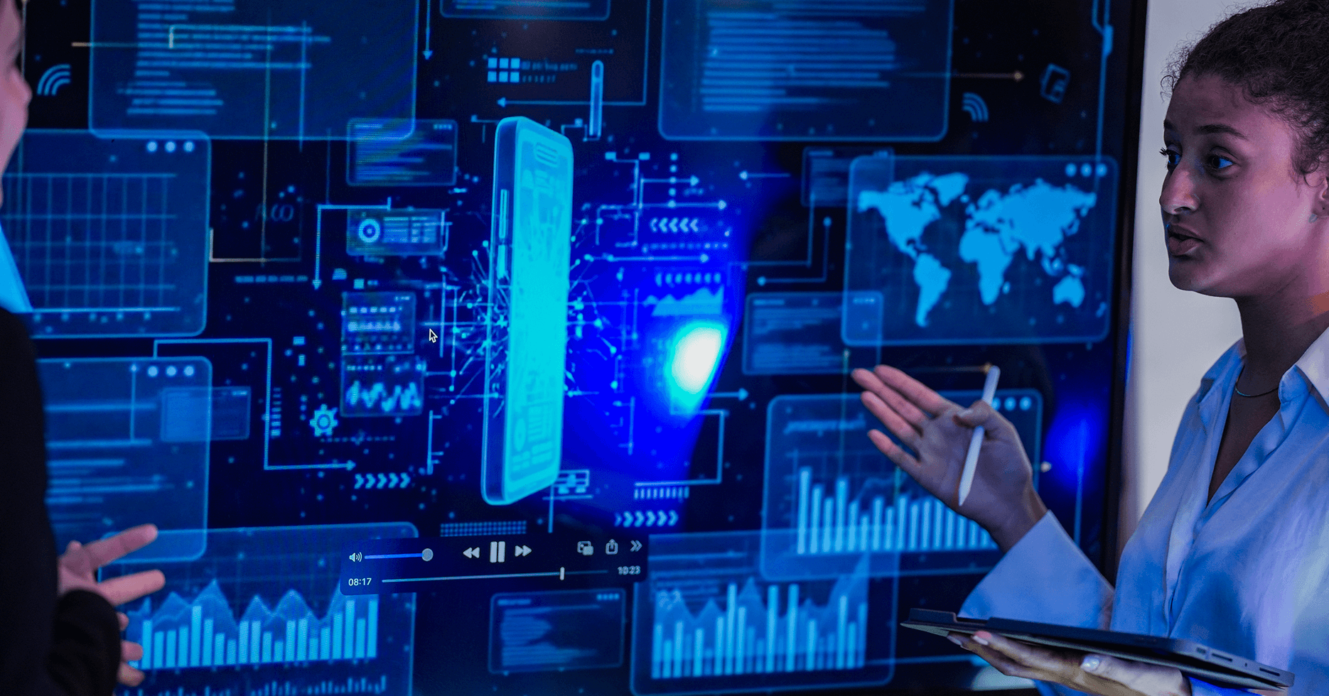 Young Woman Examining Digital Data on a Interactive Screen